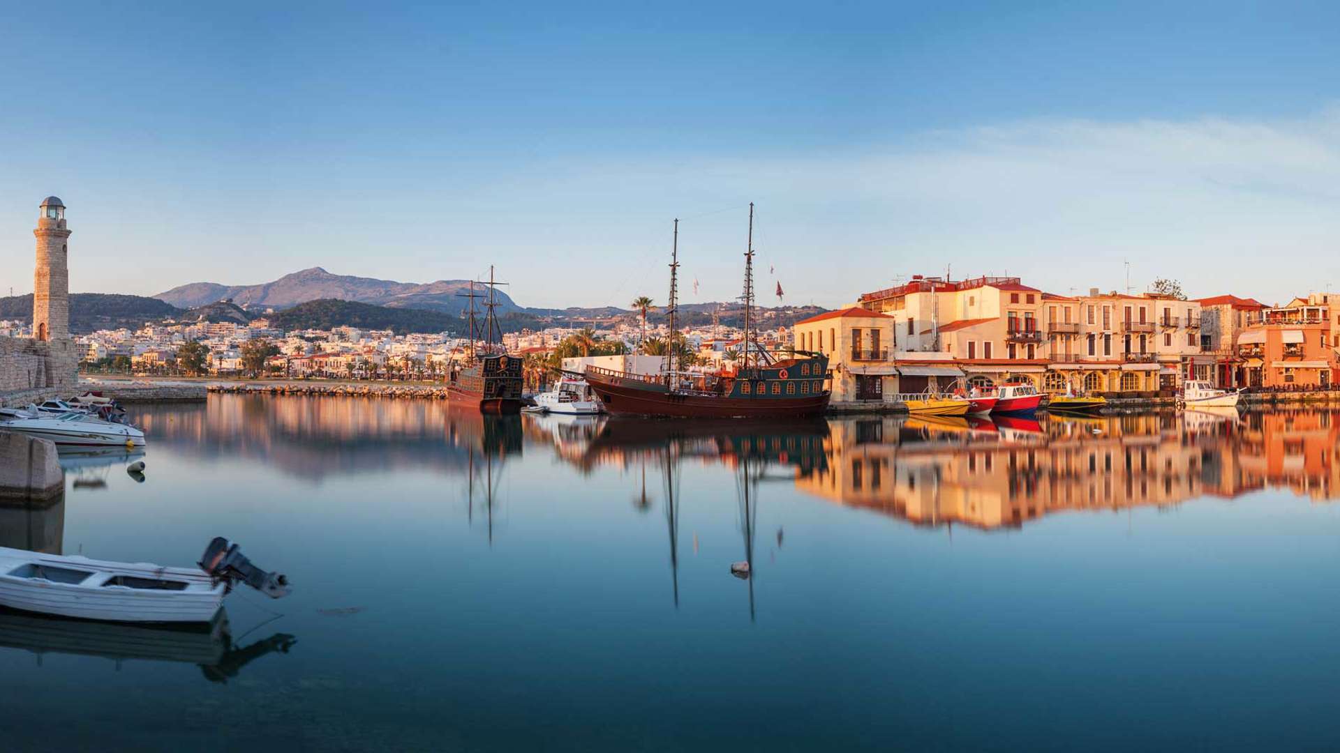 Panorama Of Old Harbour In Rethymnon With Lighthouse At Sunrise, Crete, Greece