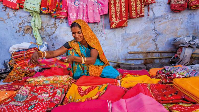 Woman selling fabrics, Rajasthan, Northern India