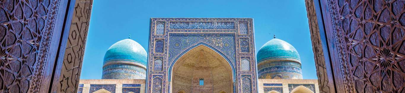 View To Mir I Arab Madrassa Thru The Old Wooden Carved Door, Bukhara, Uzbekistan 