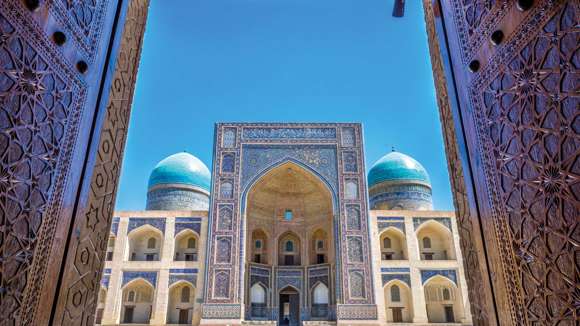 View To Mir I Arab Madrassa Thru The Old Wooden Carved Door, Bukhara, Uzbekistan 