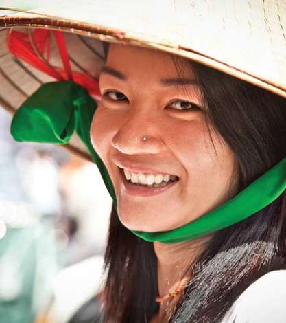 Woman wearing a traditional vietnamese hat, Vietnam